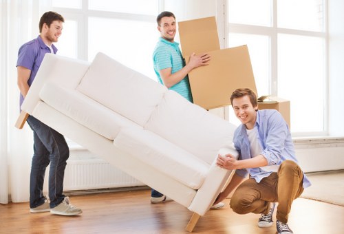 Staff assessing access and hazards before a house move