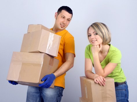 Local movers handling boxes and appliances during a Bellingham relocation