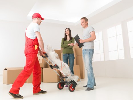 Packed boxes and furniture ready for a local house removal