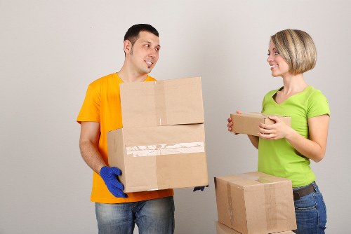 Packed moving boxes and furniture ready for transport
