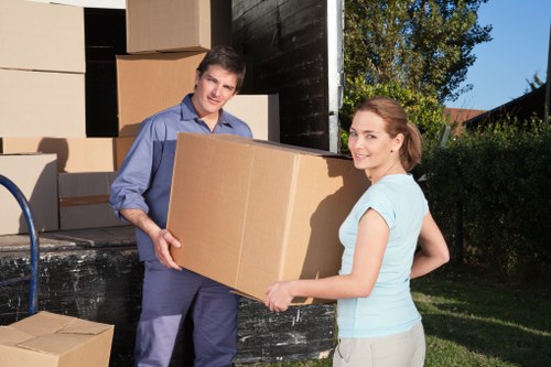 Careful furniture loading by a local moving team